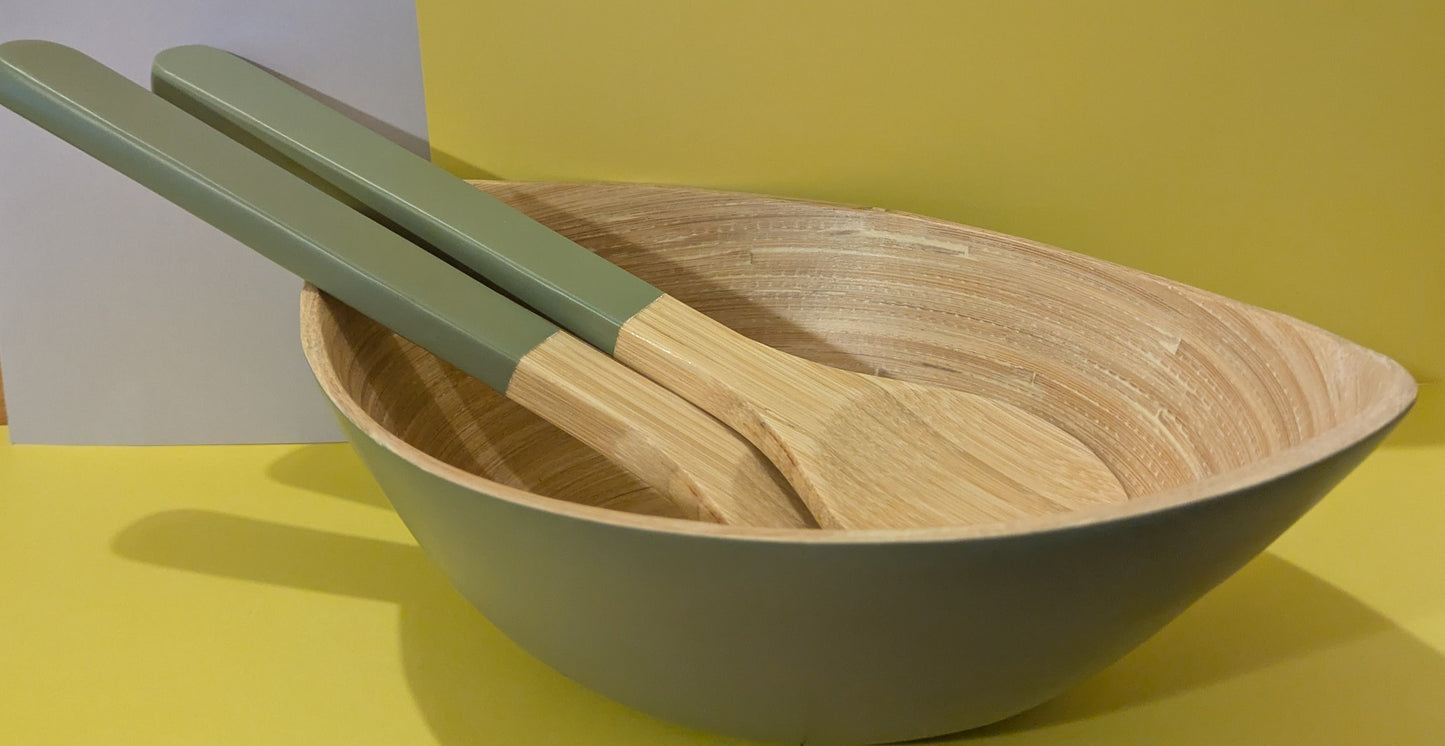 Bamboo salad bowl with utensils
